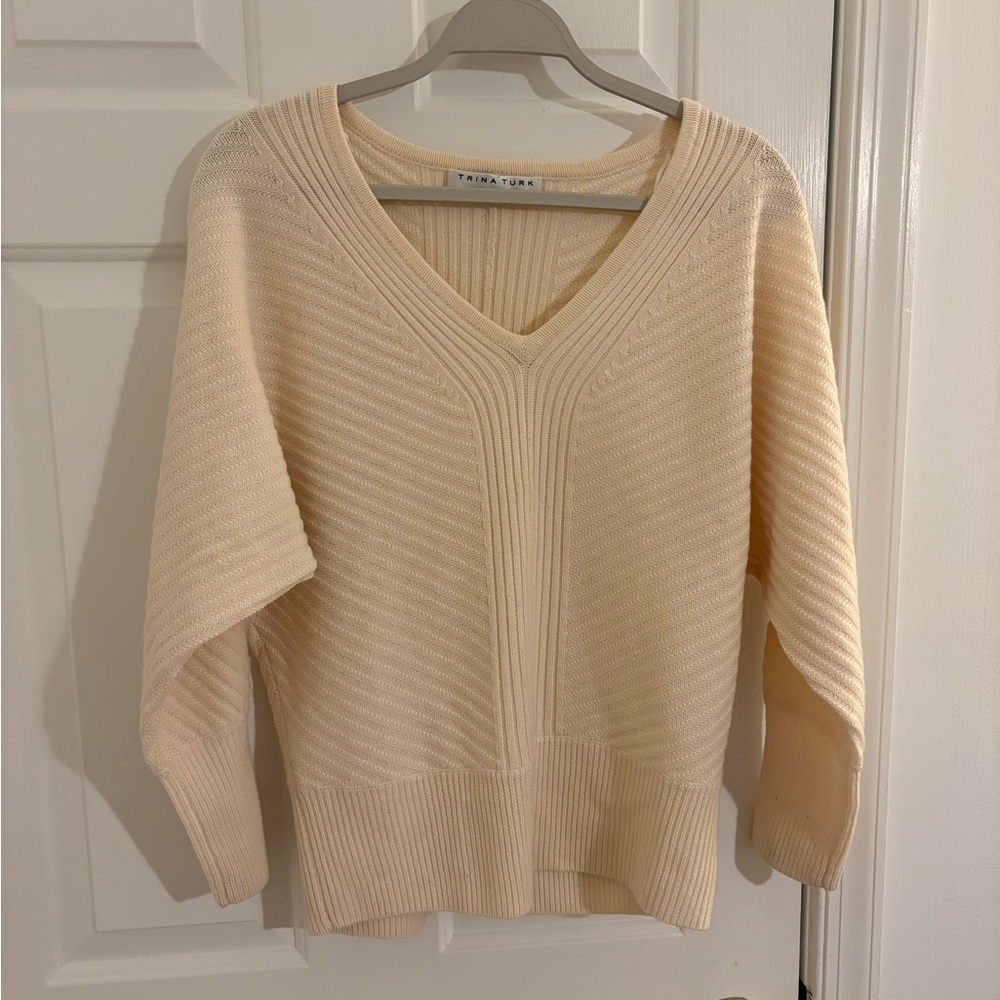 Trina Turk 100% Merino Wool Sweater.
Ivory. Size Large.